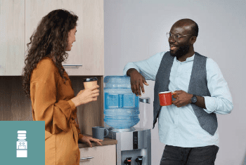 Co-workers drinking water from a WD010 chilled water dispenser