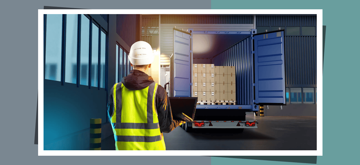 A staff member working on shift in a logistics environment