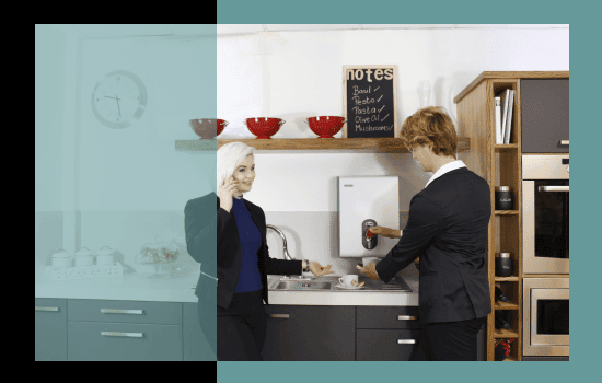 Employees preparing fast hot beverages with the BlueWave boiling water dispenser