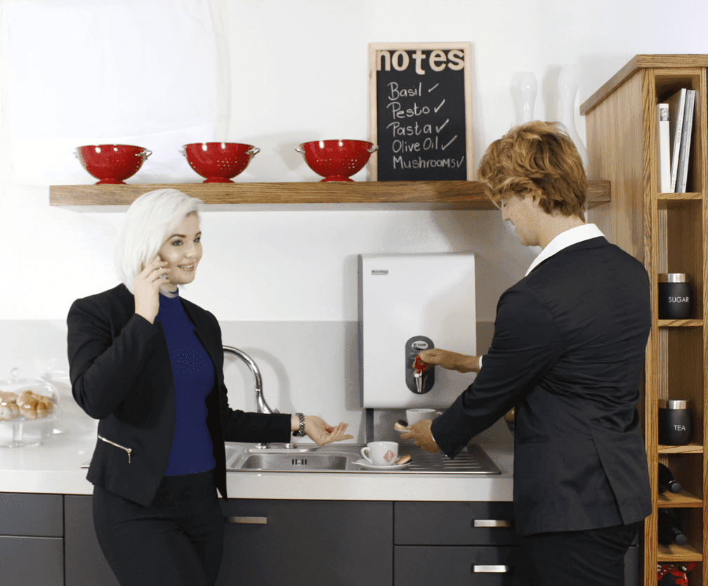 Co-workers drinking coffee from the Hydroboil boiling water unit