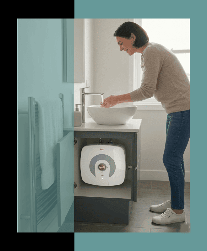 A lady washing her hands under hot water delivered by a Parisi Min Geyser