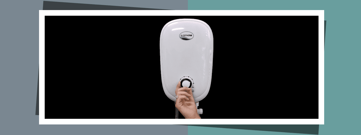 A woman adjusting the temperature of an E-Cotherm tankless electric water heater
