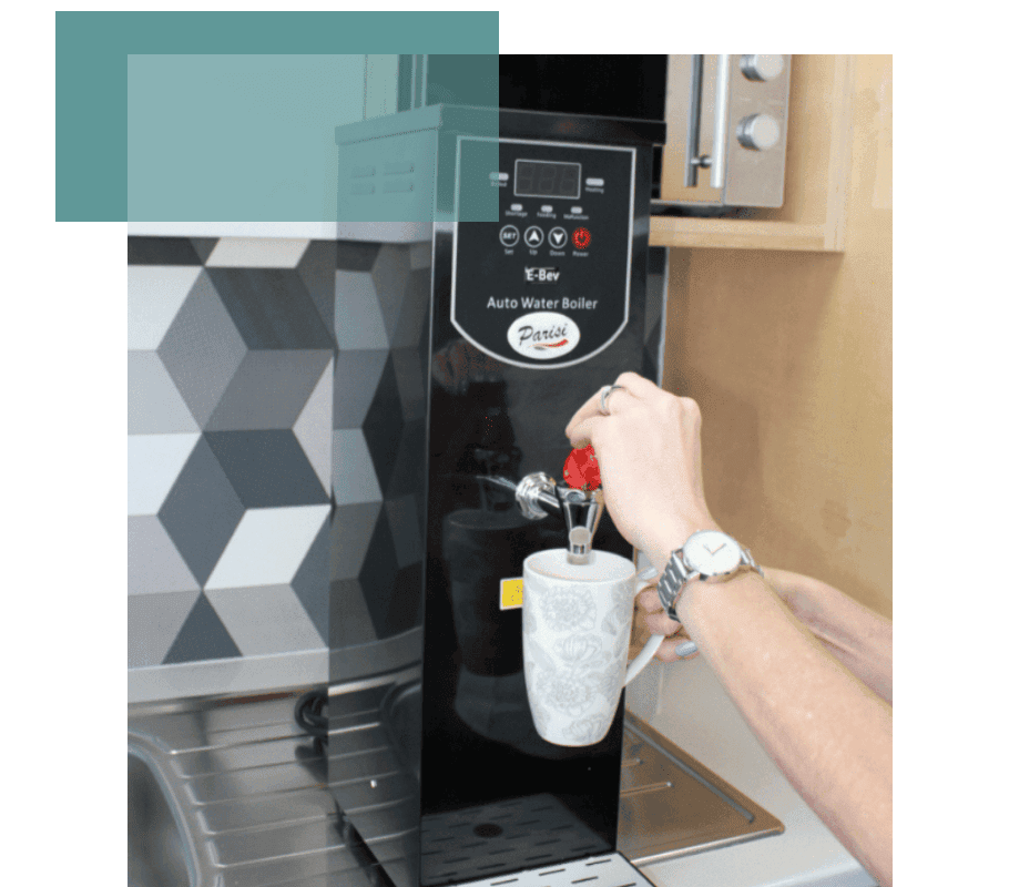 A Parisi E-Bev Countertop boiling water dispenser being used to dispense boiling water