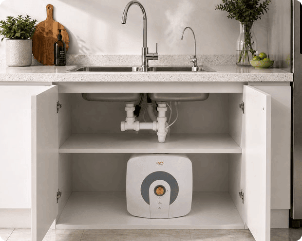 Parisi point-of-use undercounter mini geyser installed in the cupboard beneath a kitchen sink